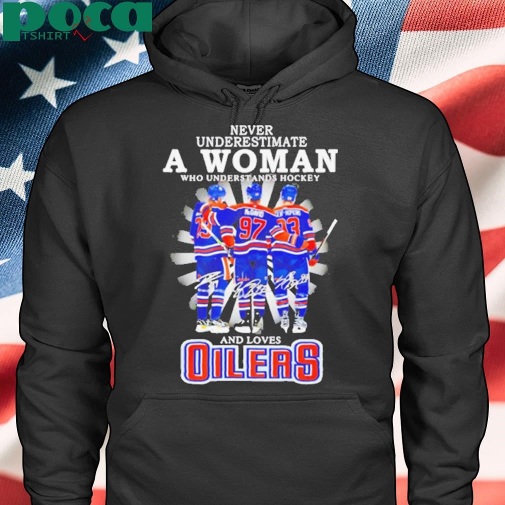 A woman who understands hockey and loves Oilers hockey shirt