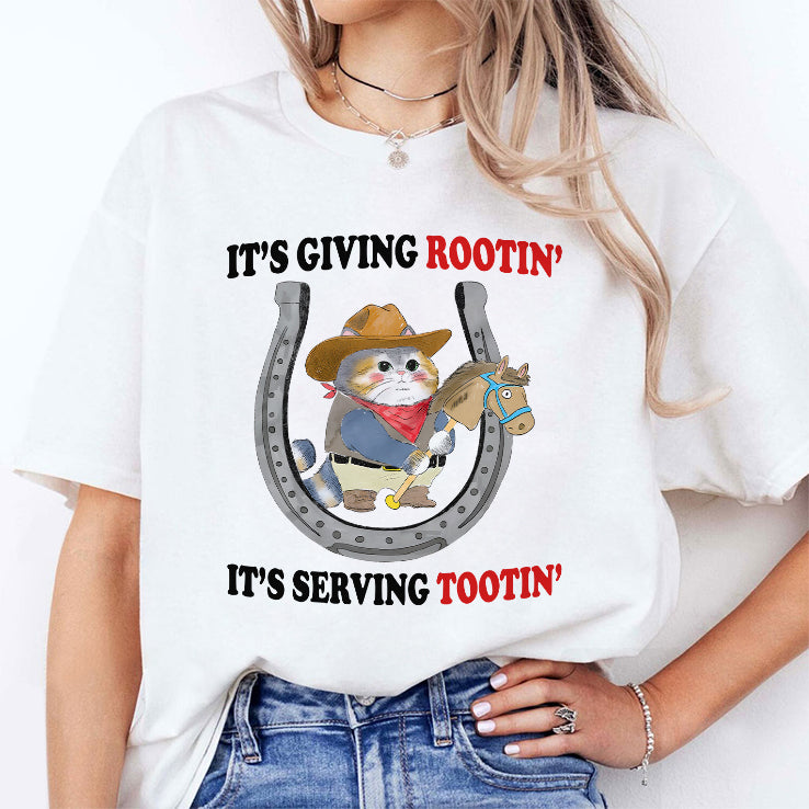 Cowboy Cat It’s Giving Rootin’ It’s Serving Tootin’ T Shirt