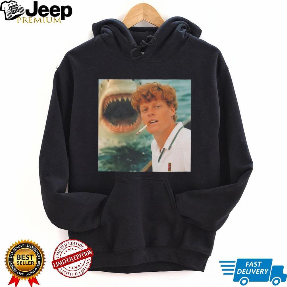 Jannik Sinner chilling beside shark funny shirt