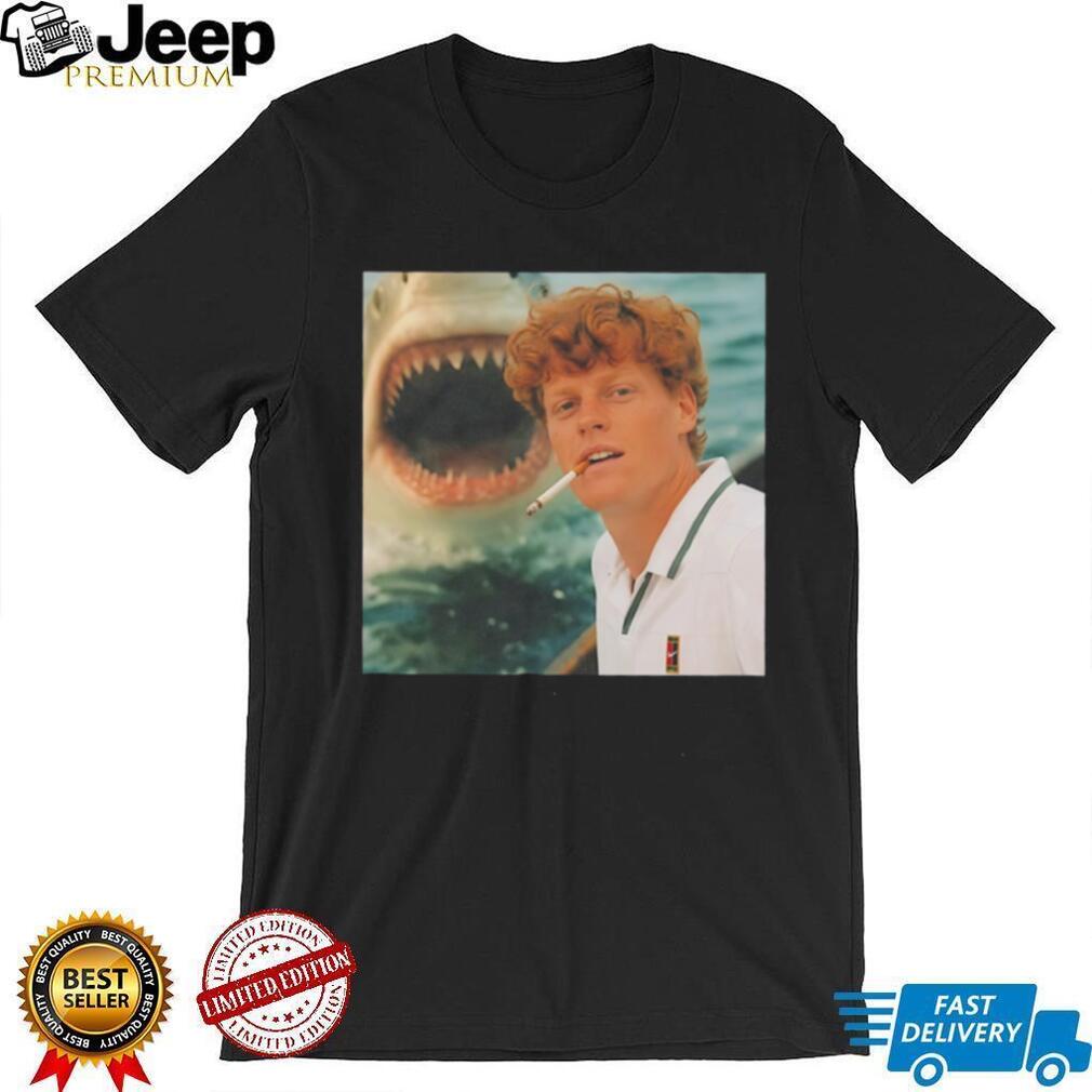 Jannik Sinner chilling beside shark funny shirt
