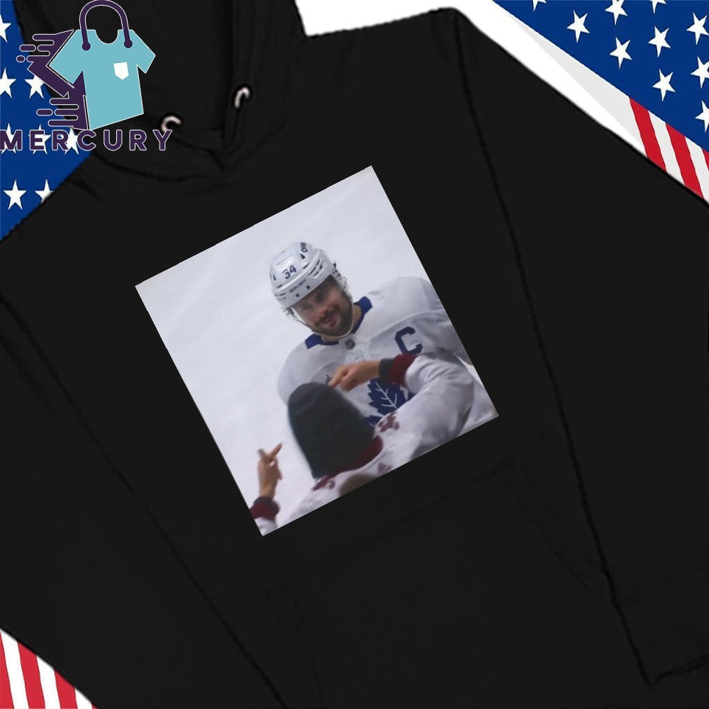 Auston Matthews Smirks At The Avs Fans Shirt