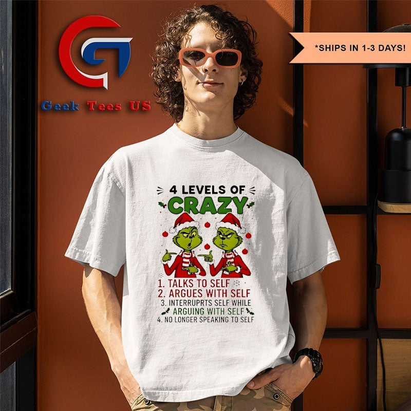 Santa hat Grinch 4 levels of crazy talks to self argues with self interrupts self while Merry Christmas shirt