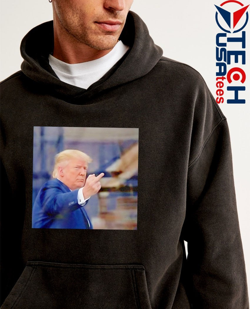 Trump flips off middle finger on Michigan shirt
