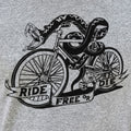 Ride Free or Die Tattoo Style Snake Riding a Bicycle