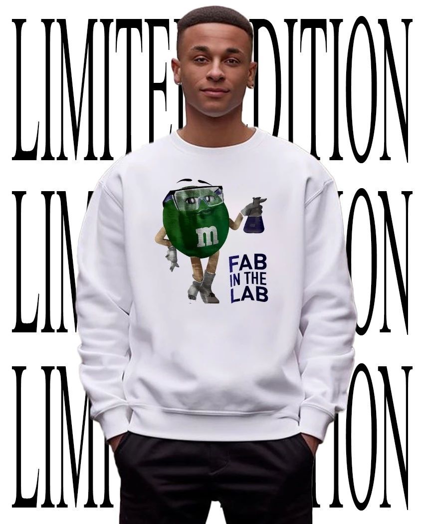 M and M’s Ms Green fab in the lab holding beaker wrench caricature shirt