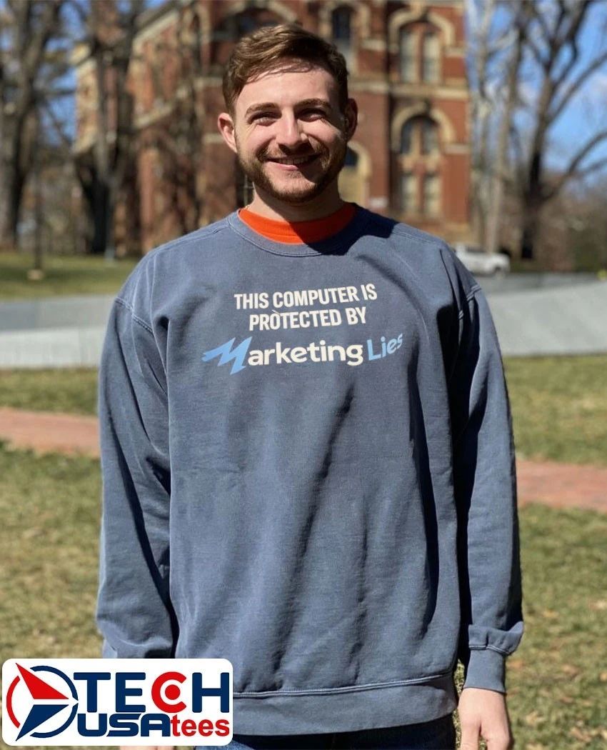 This computer is protected by marketing lies shirt