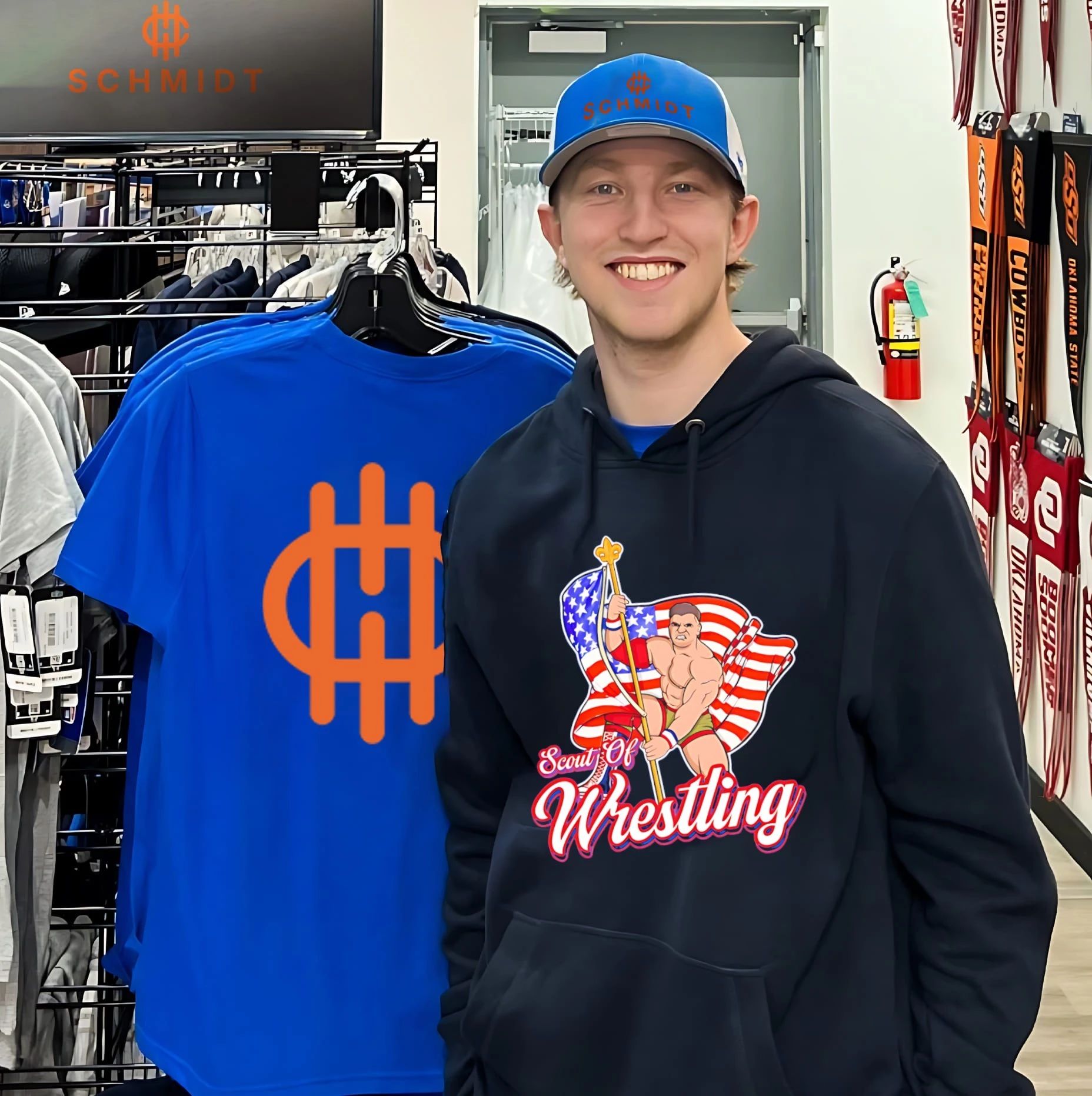 Scout of Wrestling Danny Everbourne holding American flag illustrated shirt