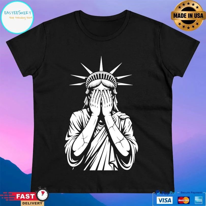 The Statue Of Liberty With Her Head In Her Hands T-shirts
